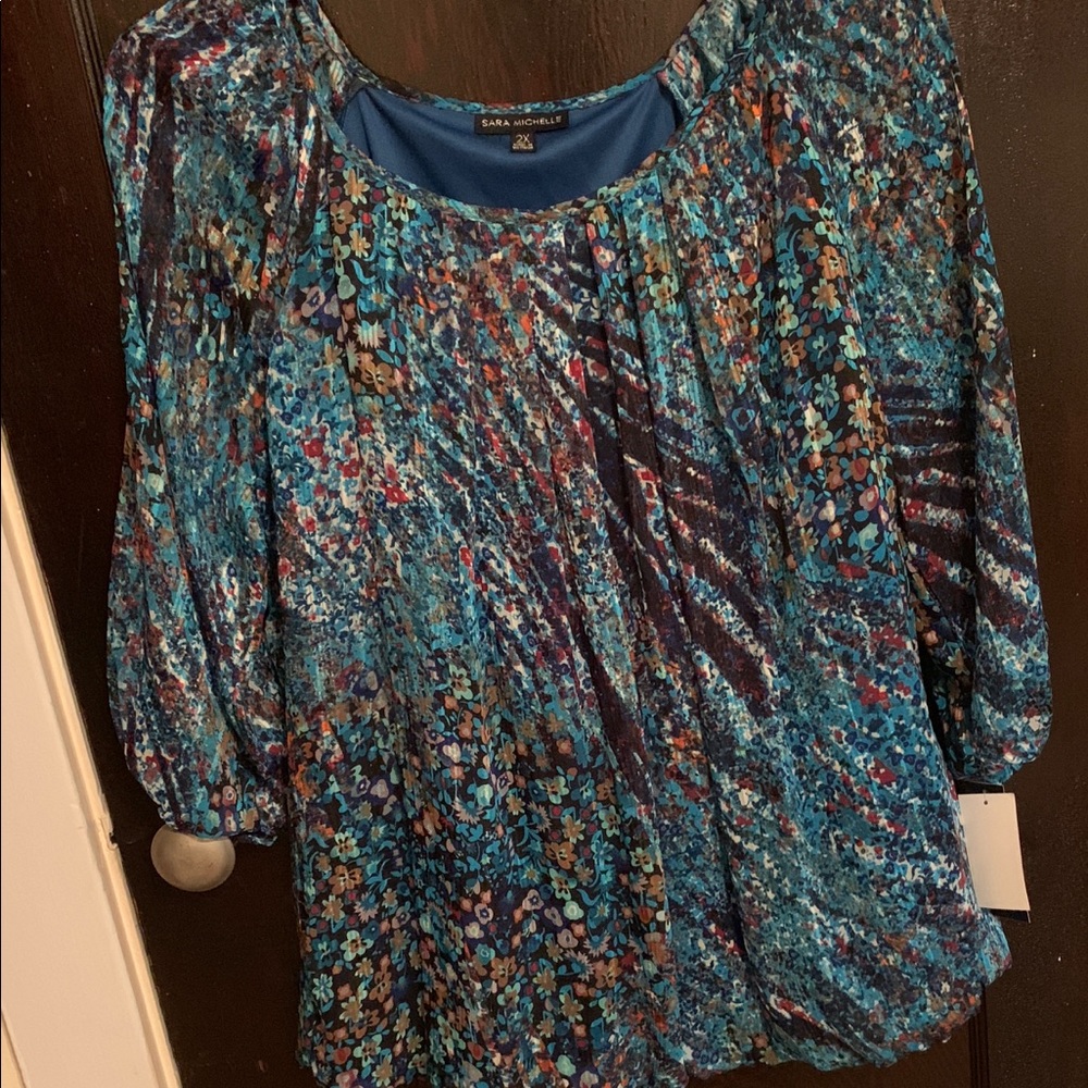 NWT. Pretty multi colored top
